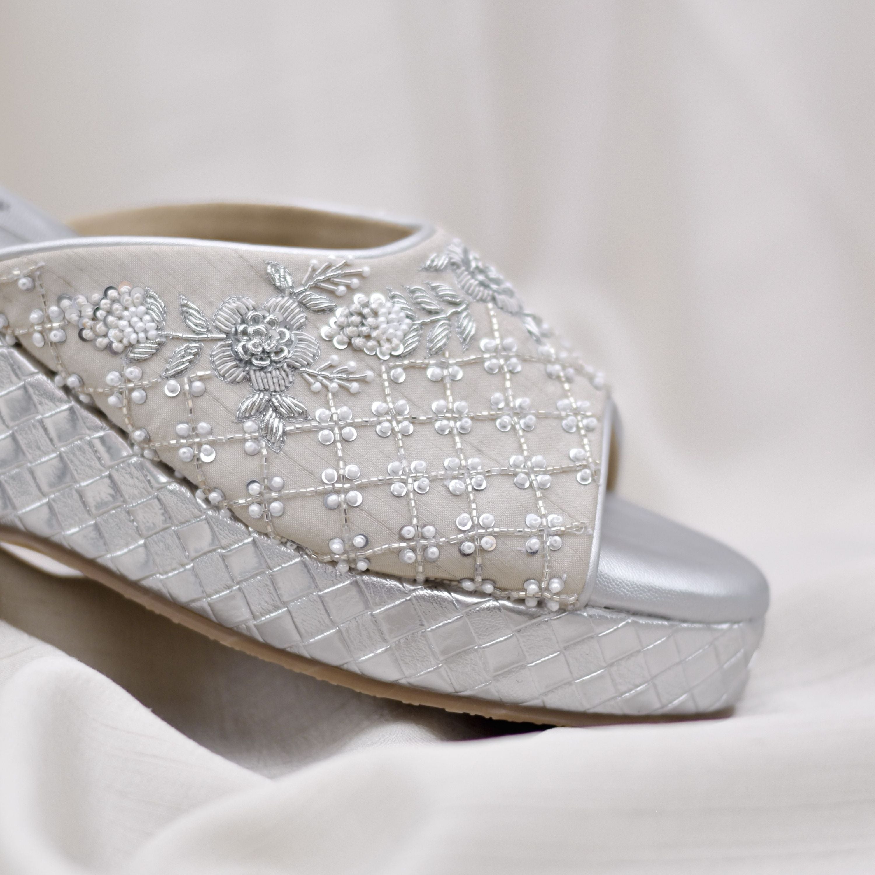 Silver embroidered shoe on a comfort sole