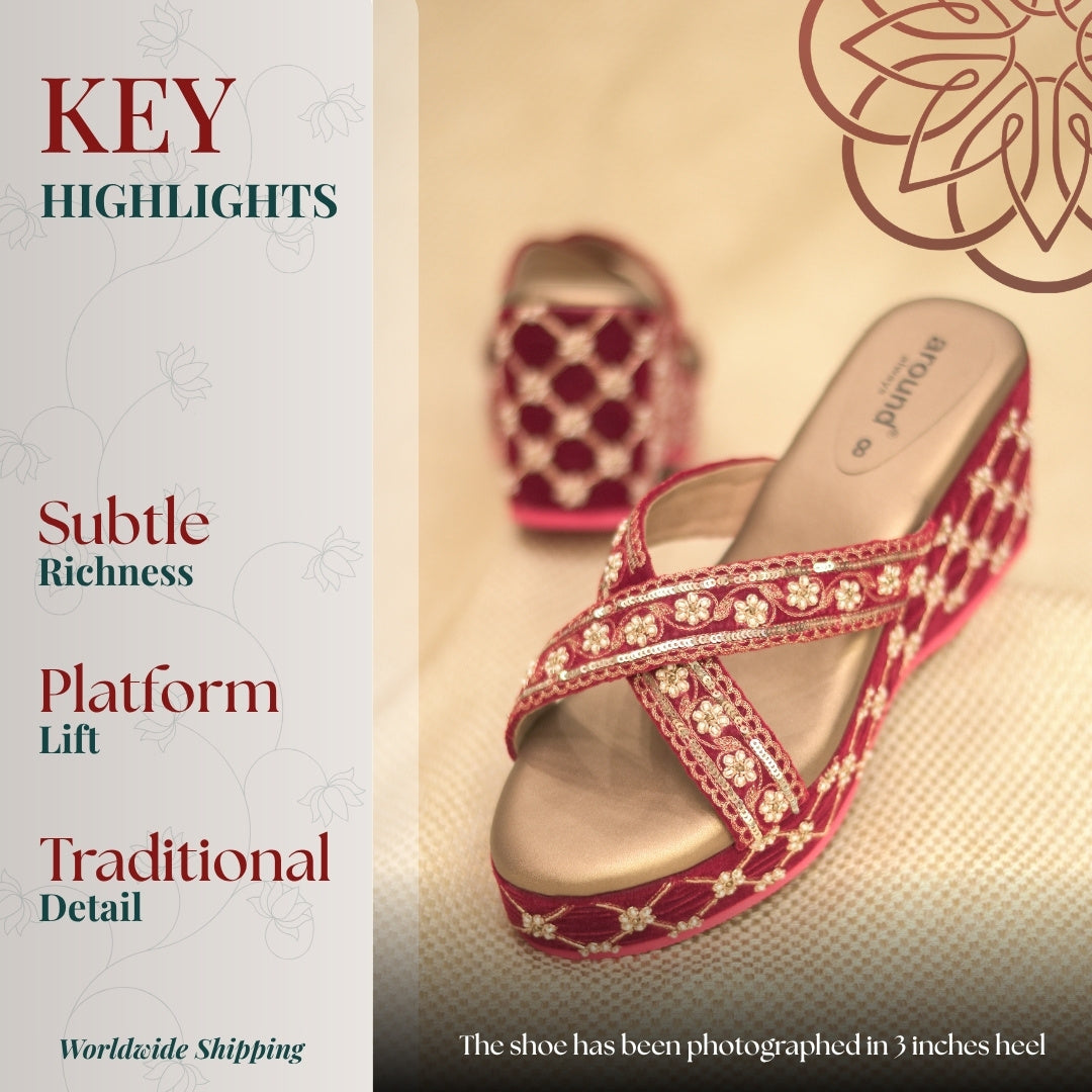 Red platform wedge sandals with crisscross embroidered straps