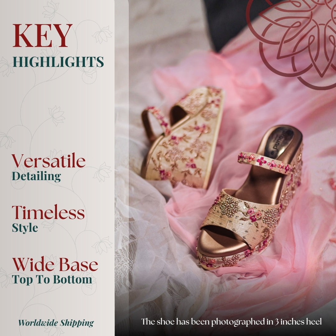 Floral embroidered platform sandal with soft pink tones and wide base