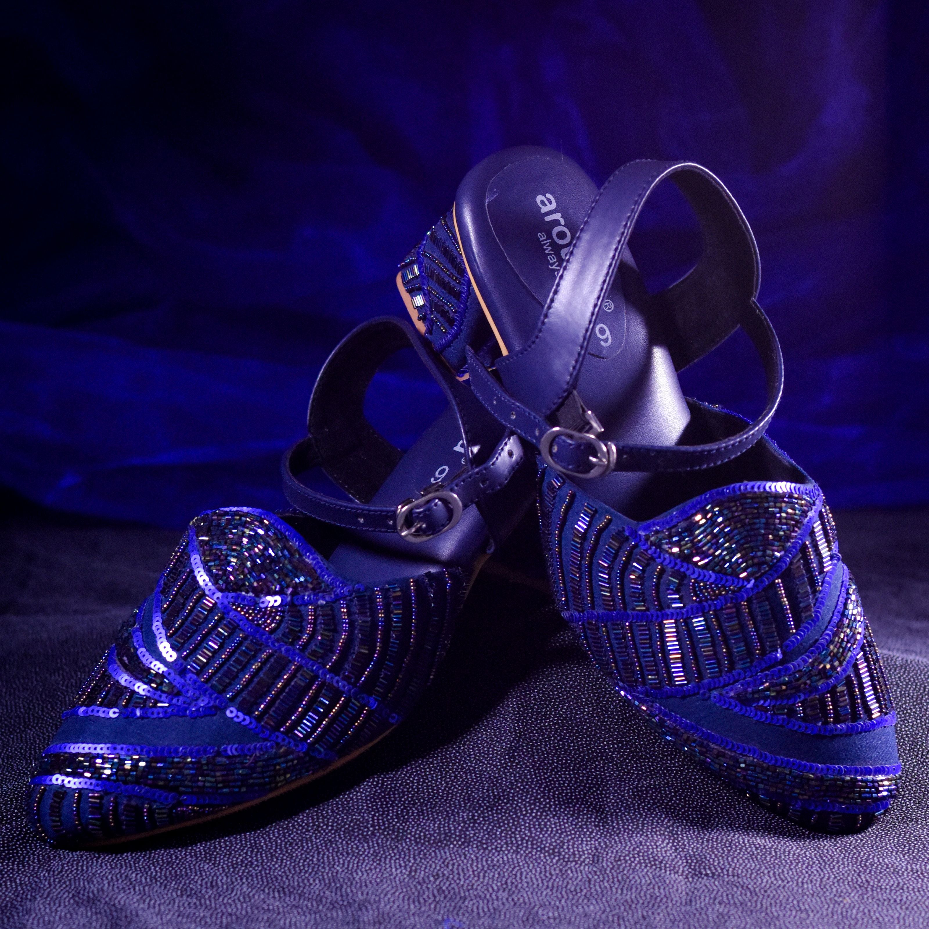 Designer navy mules with secure buckle and anti-slip sole
