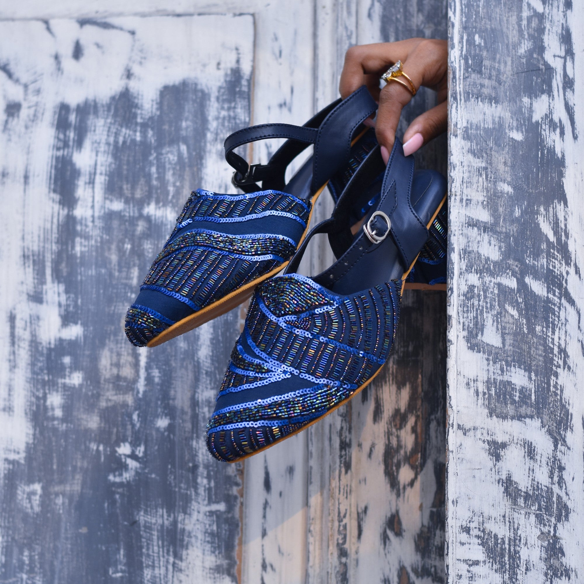 Embellished sandals in navy blue for blingy sangeet gowns
