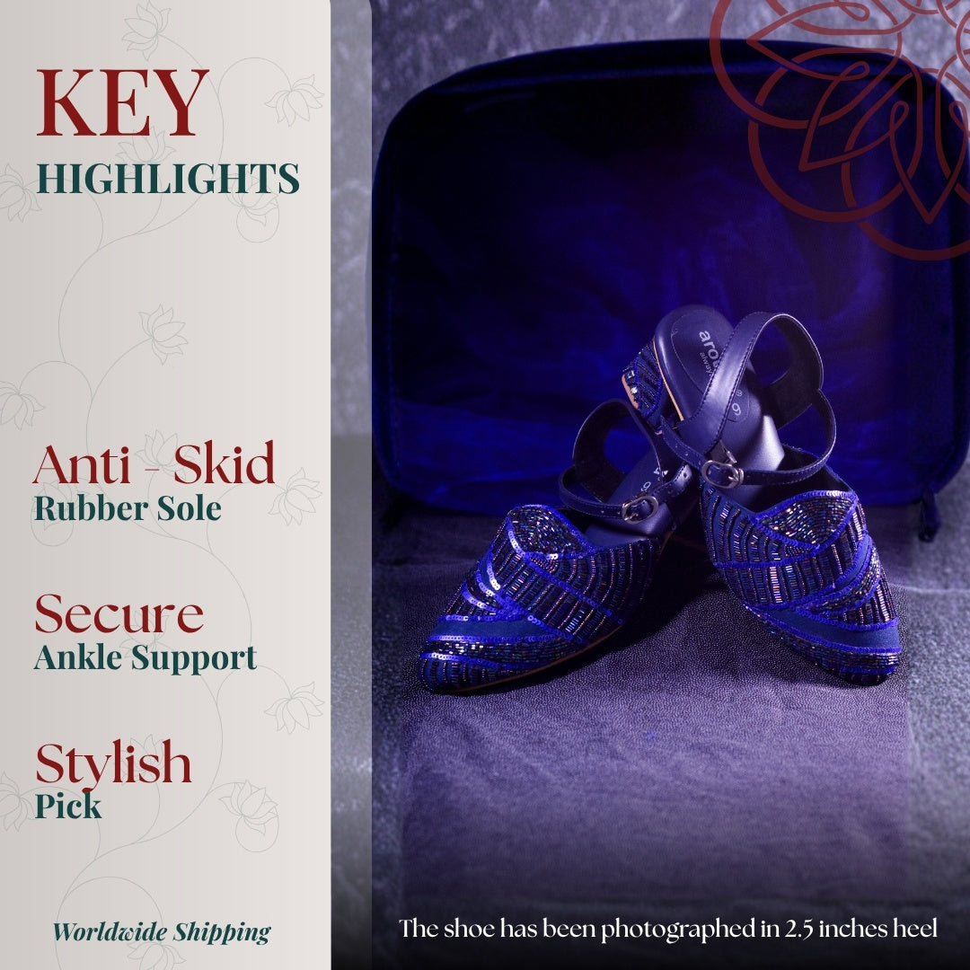 Navy blue loafers with geometric threadwork design