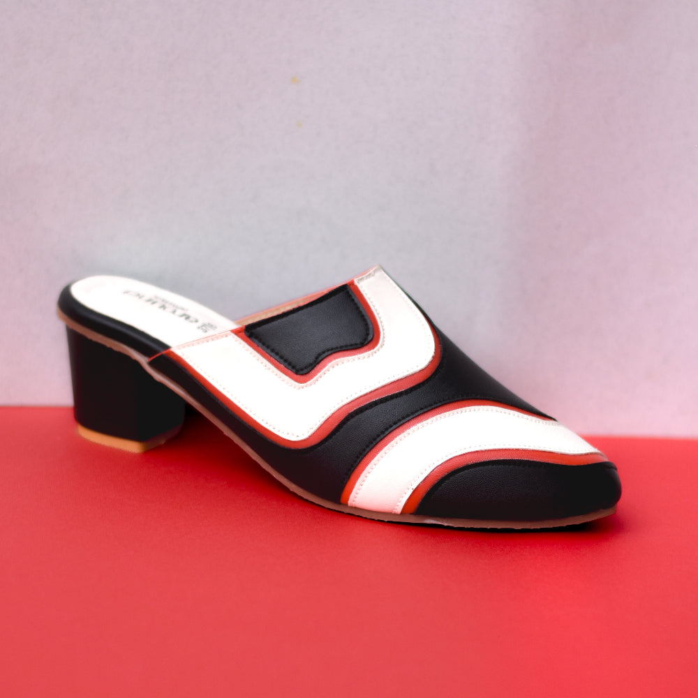 Contemporary block heel mule with graphic colour-block design
