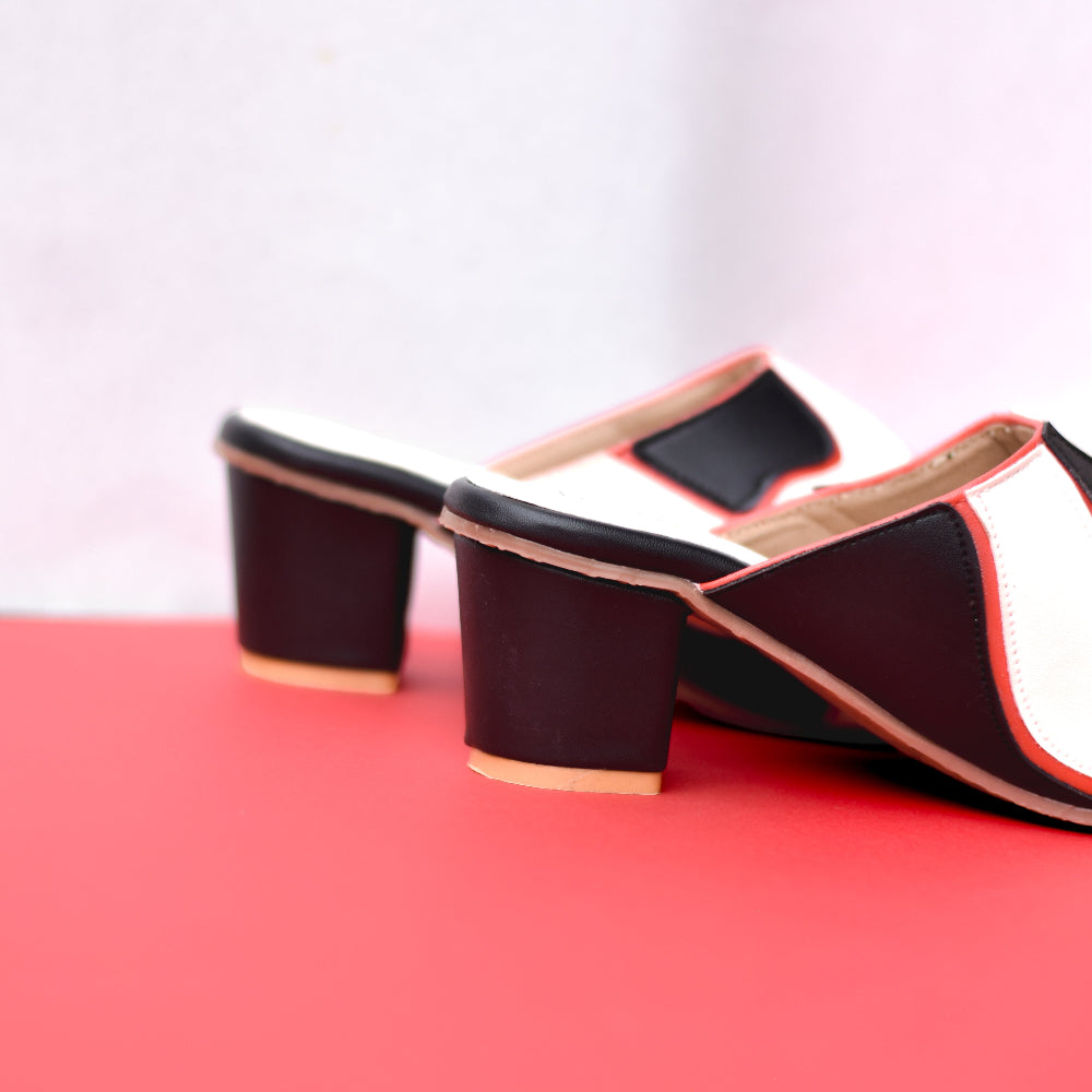 Black mule heel with ivory and red colour-block wave detailing
