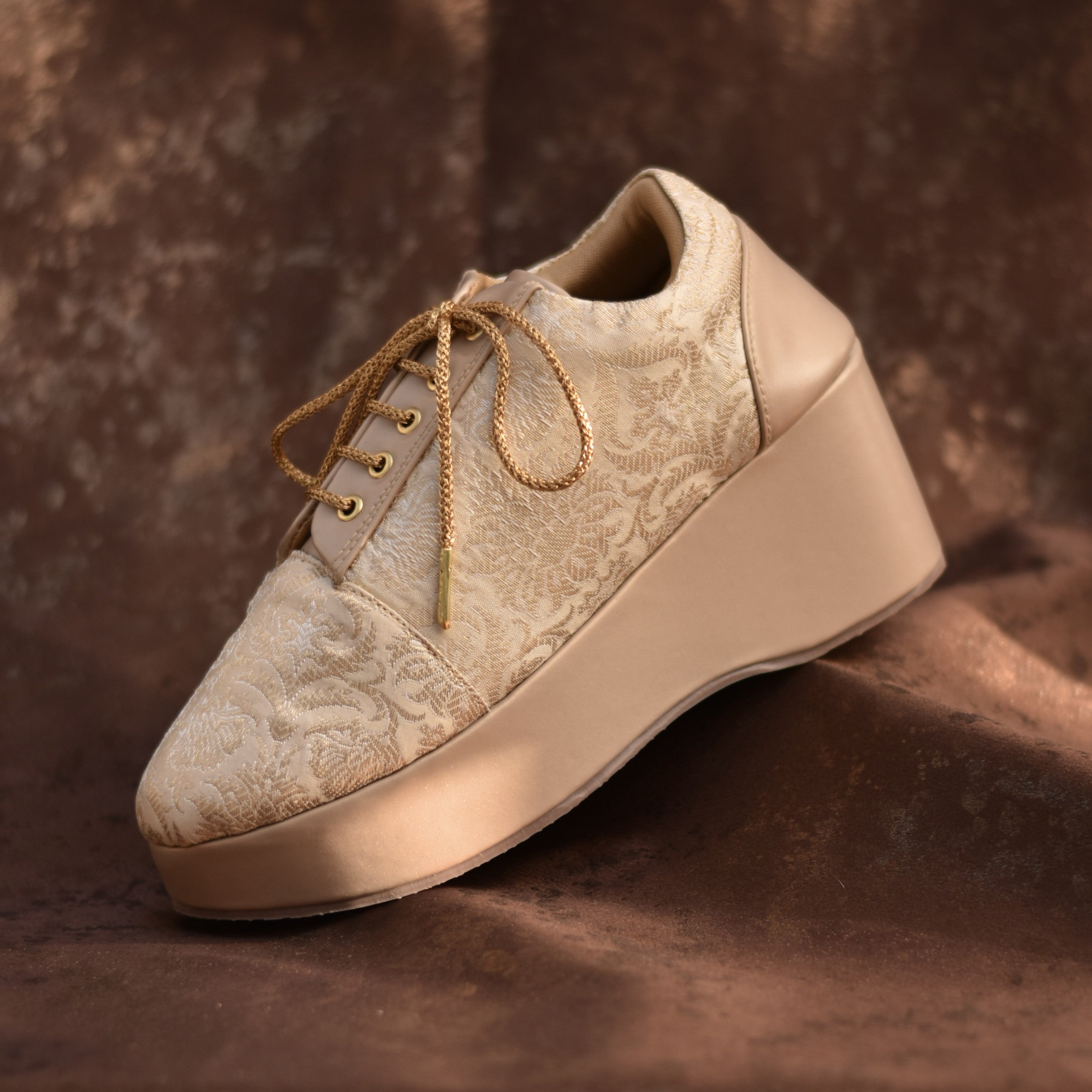 Designer bridal sneaker in golden brocade with chunky 4inch wedge sole