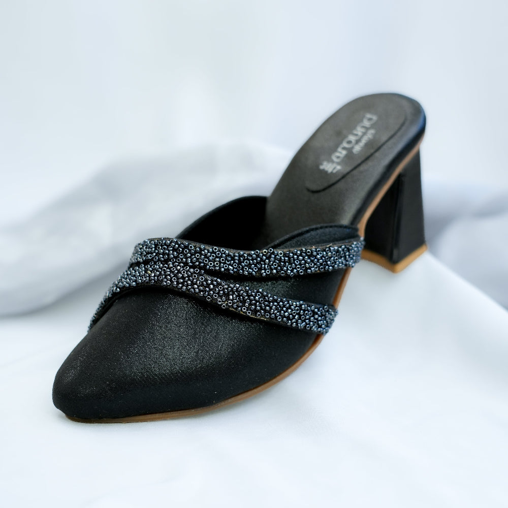Black embellished mule with beaded straps
