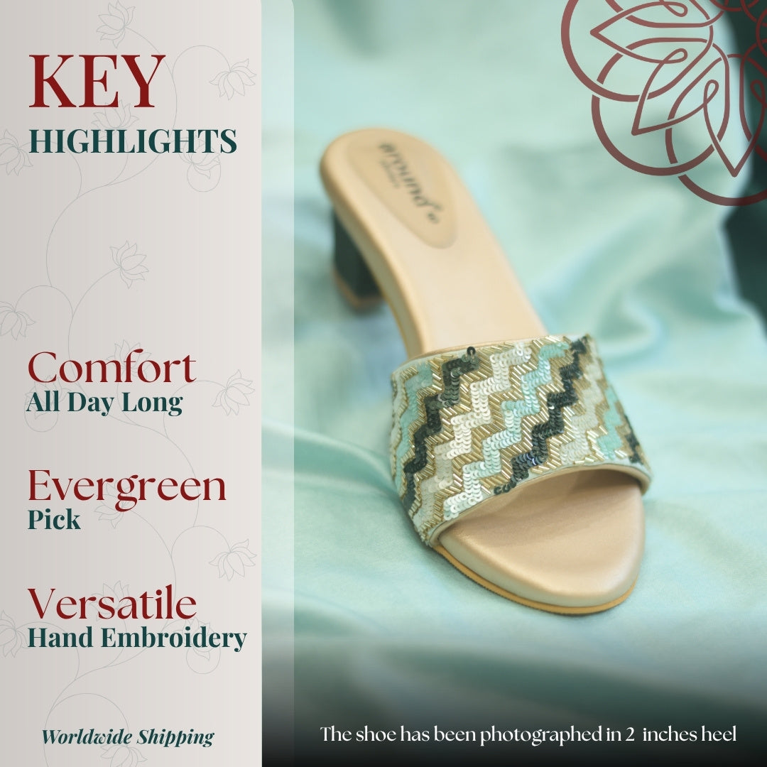 Gold and sea green block heels with geometric sequin embroidery, open toe design, and comfortable mid heel for versatile occasions.