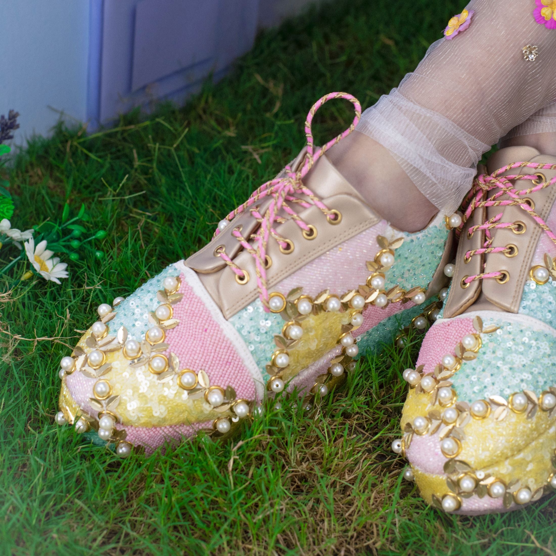 Statement platform sneakers with soft colour blocks and bead highlights