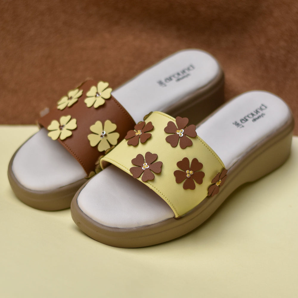 Mismatched floral platform slides with caramel and butter-yellow mirror straps