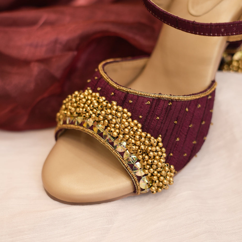 Wine-coloured wedding heels with gold striped wedge
