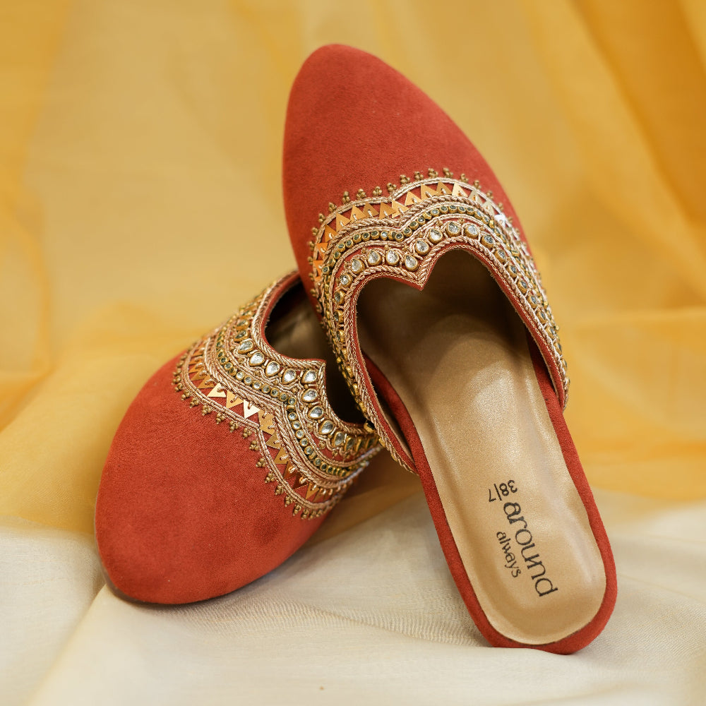 Red open-toe block heels with floral embellishments
