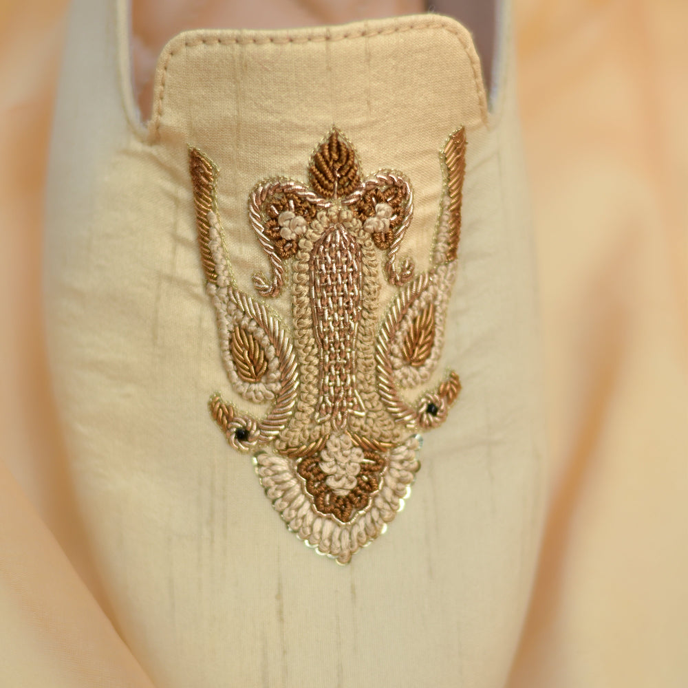 Silk-textured footwear with detailed zari work and delicate embellishments