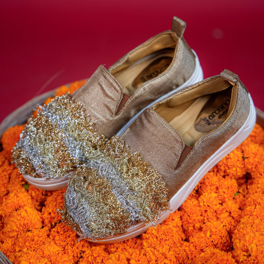 Champagne slip-on with layered gold and silver metallic front detailing
