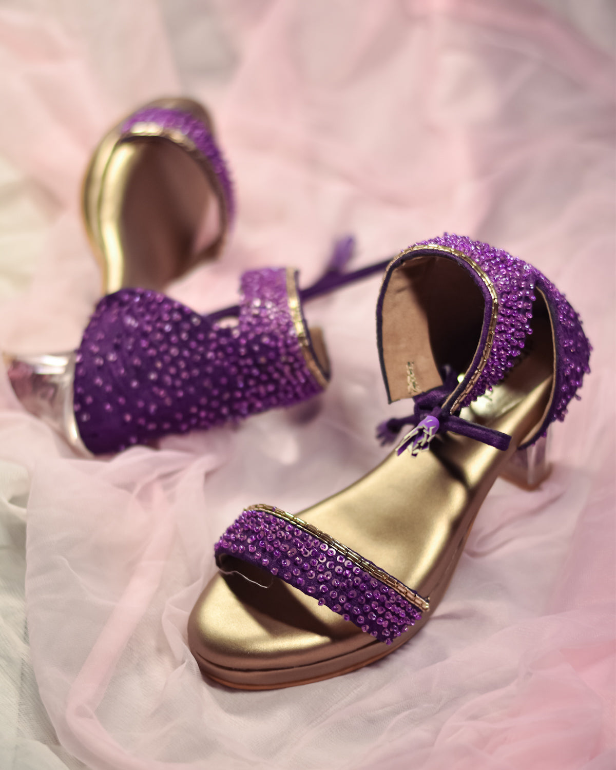 Purple high-heeled party sandals with sequins embellishments