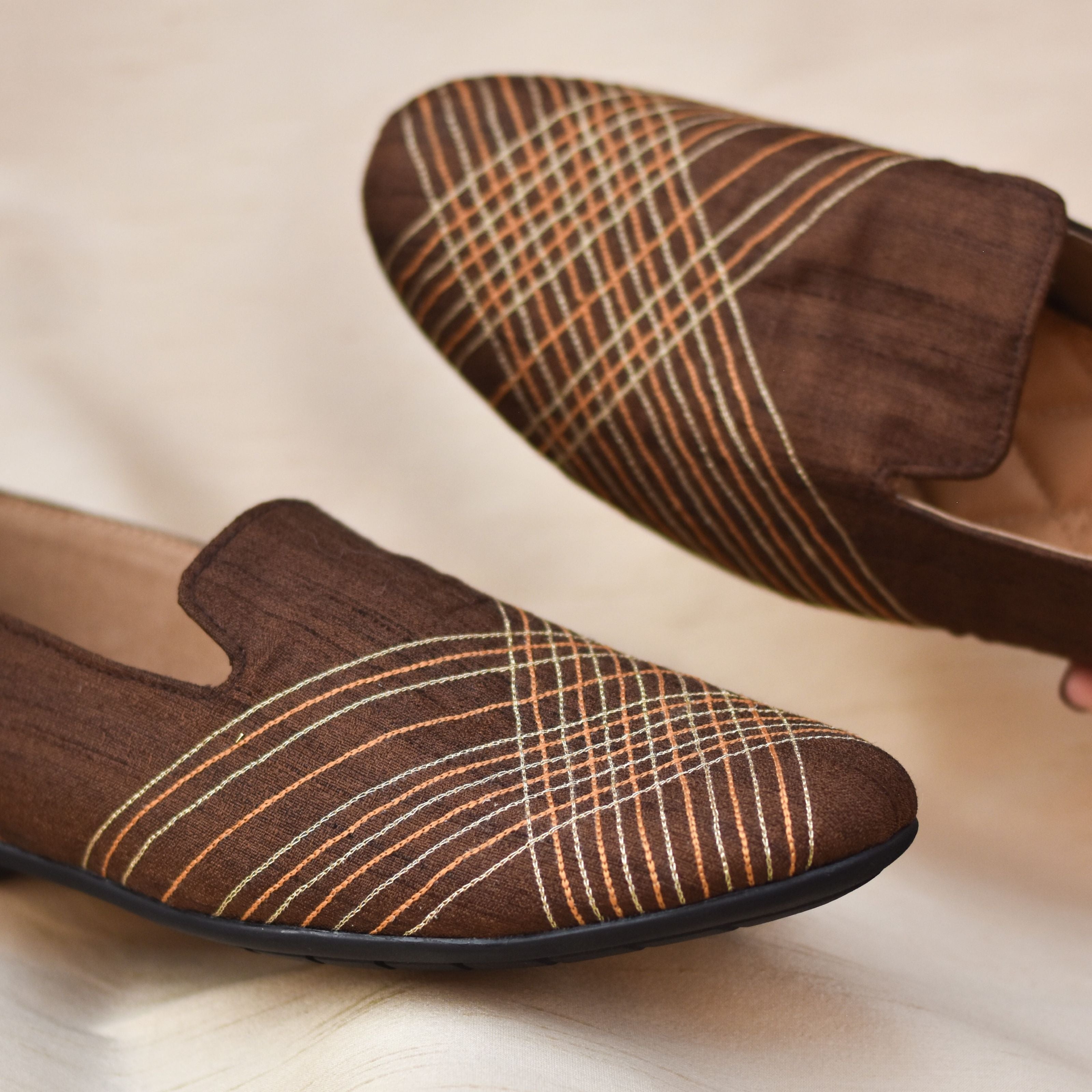 Contemporary brown wedding loafers with linear threadwork and comfort padding.