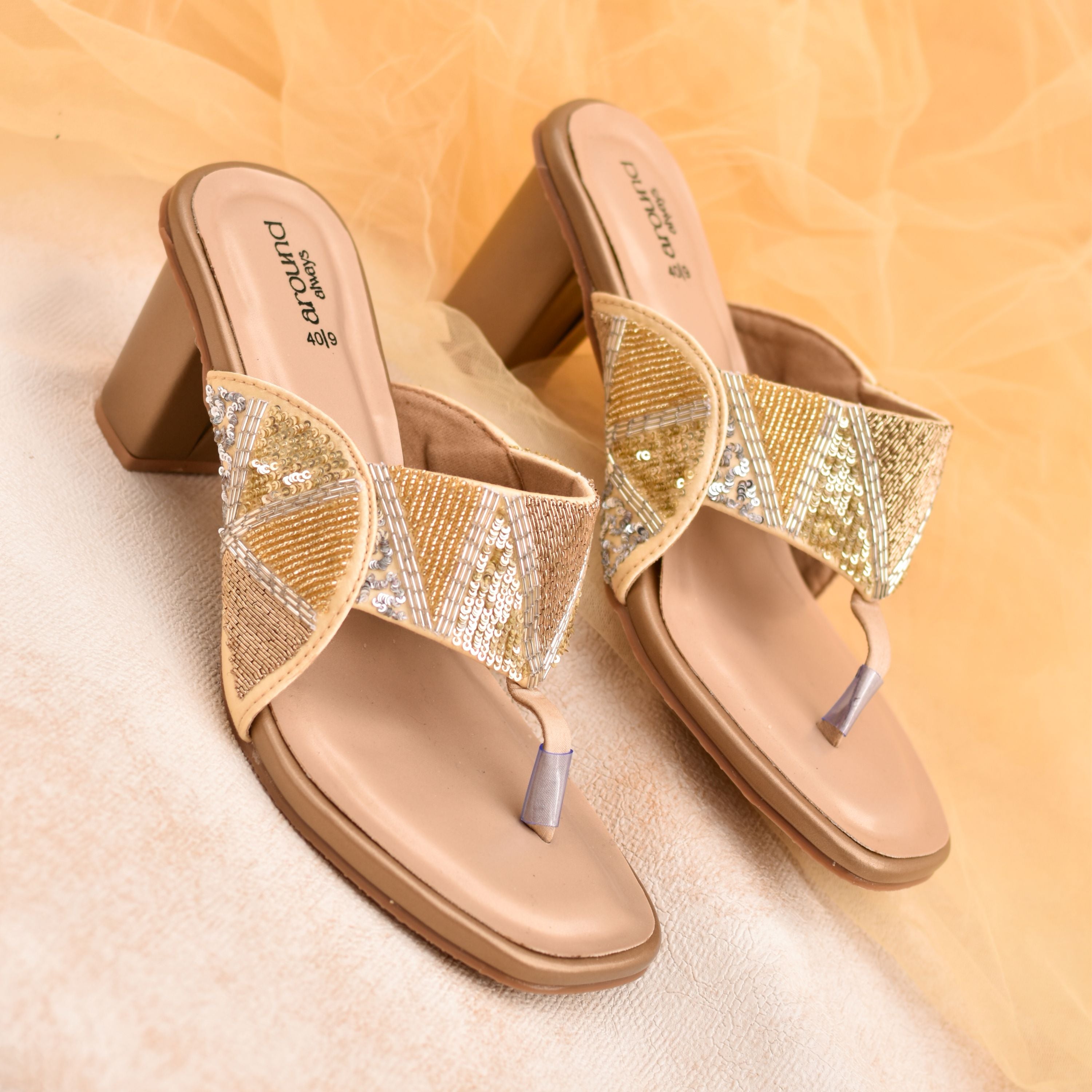 Designer gold block heels with cushioned sole and sequin, beads and zardozi embroidery.