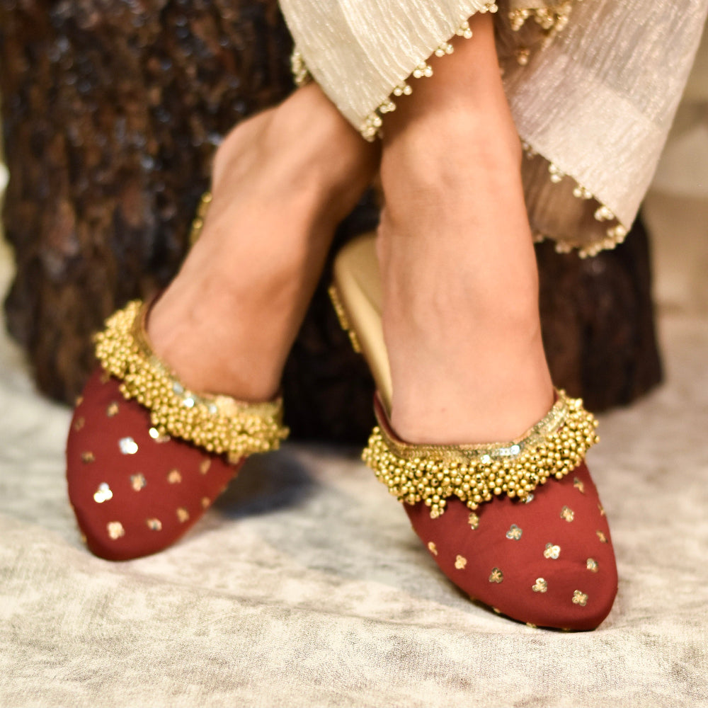 Statement ethnic mules in red and golden colours and decorative block heel