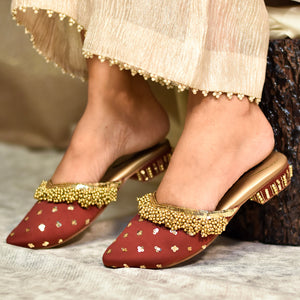 Red ethnic slip-on heels with gold ghungroo embellishment for ethnic wear