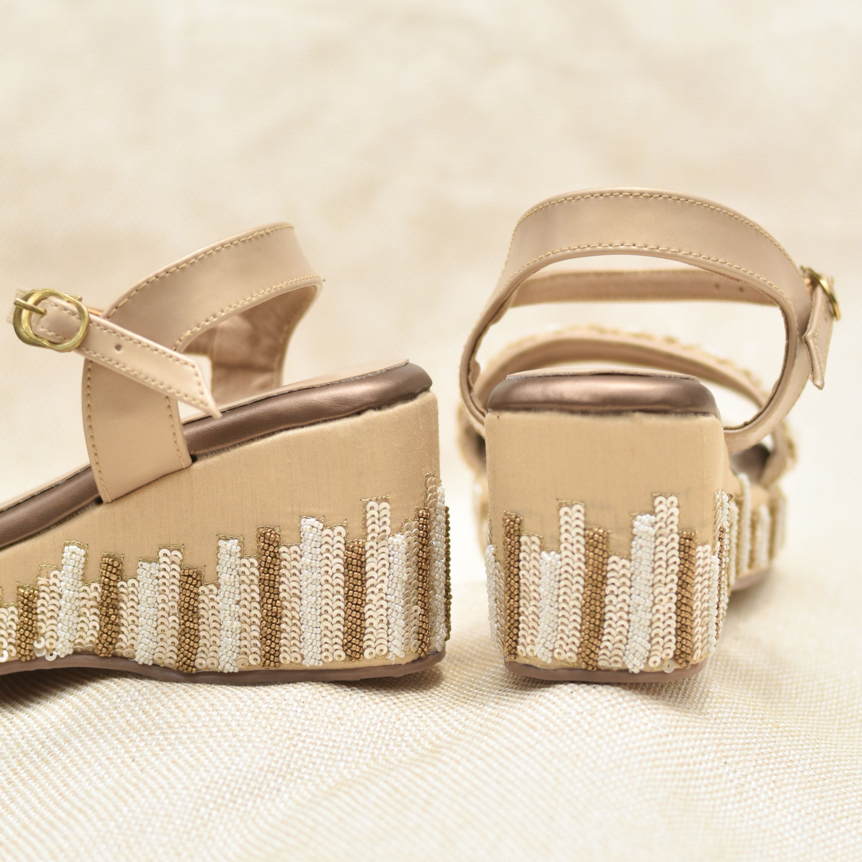 Intricately hand embroidered sequins and beads on platform heel in golden colour