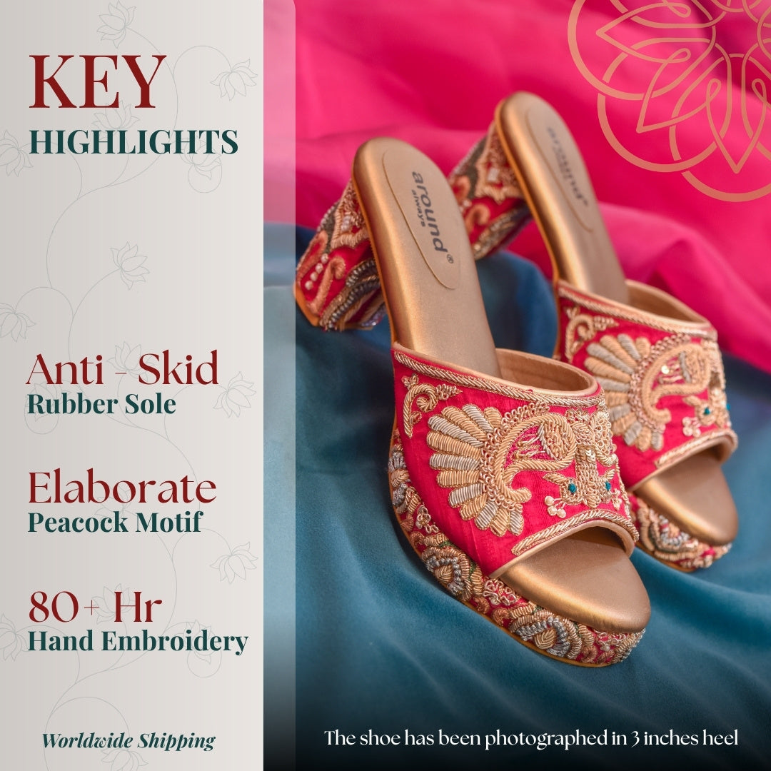 Rani pink embroidered heels with elaborate peacock motif and platform base