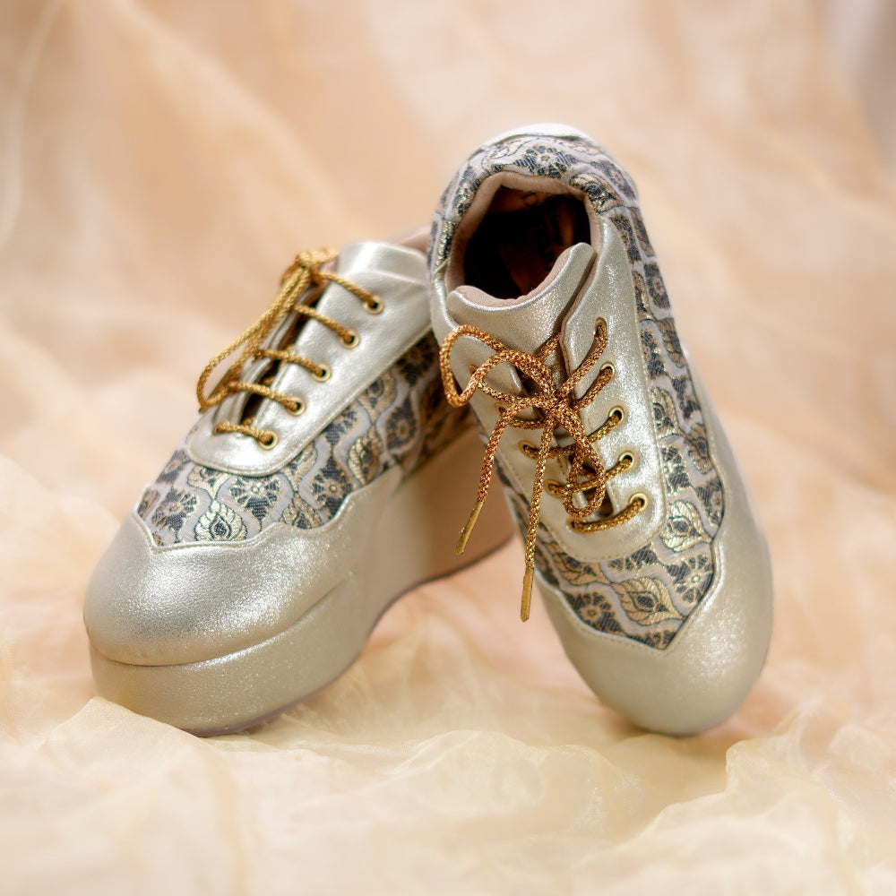 Wedding ready wedge sneakers with woven heritage patterns and comfortable platform heel
