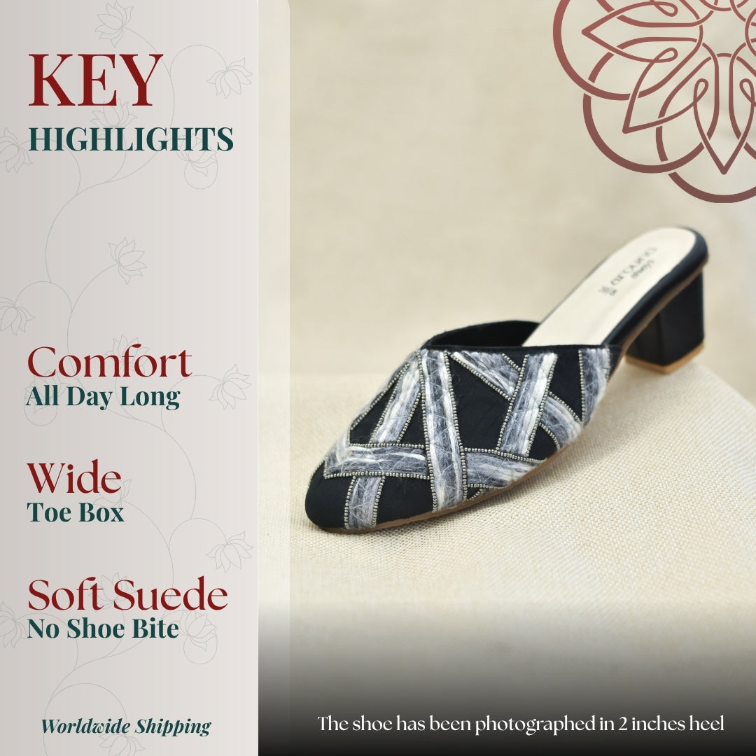 Black embroidered mule with geometric threadwork and low block heel