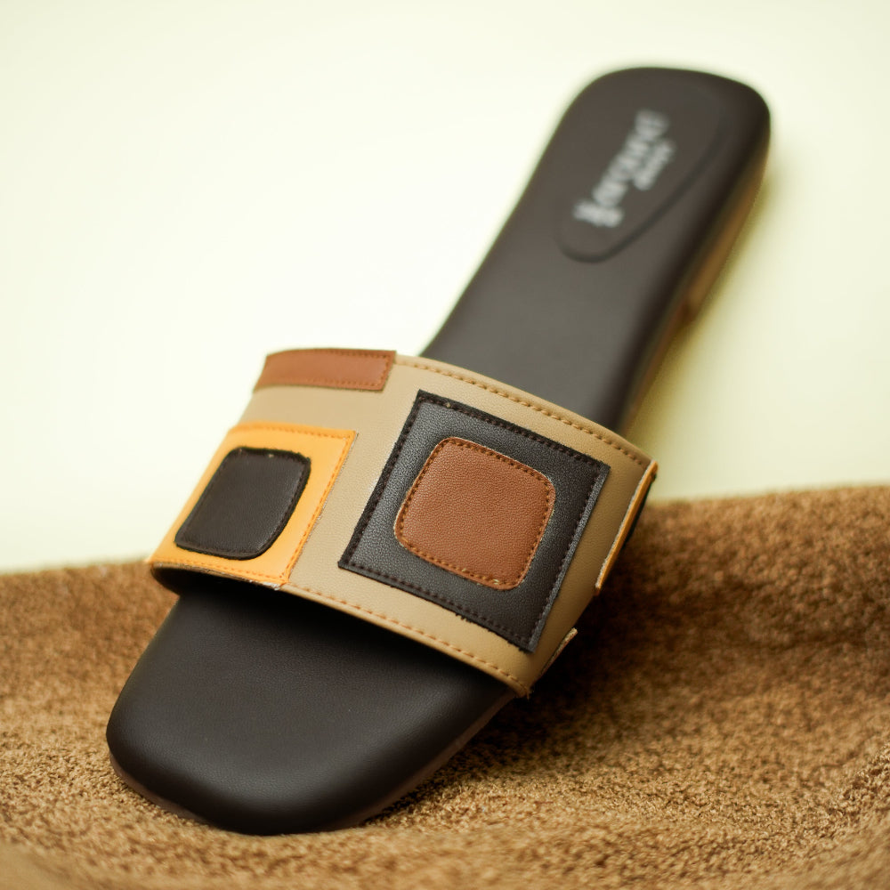 Contemporary beige and black slide with layered square details
