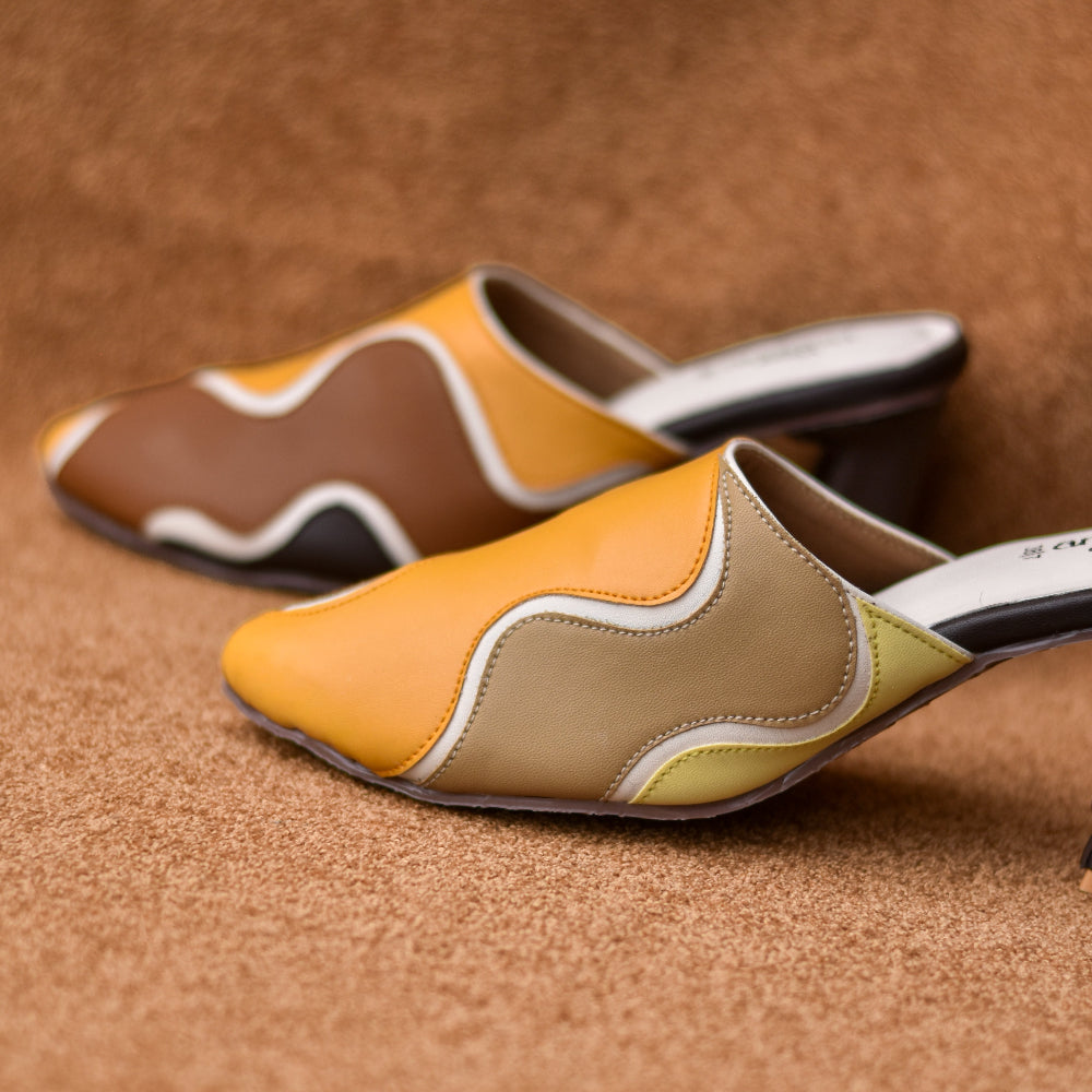 Contemporary closed-toe mule with flowing colour-block design and block heel