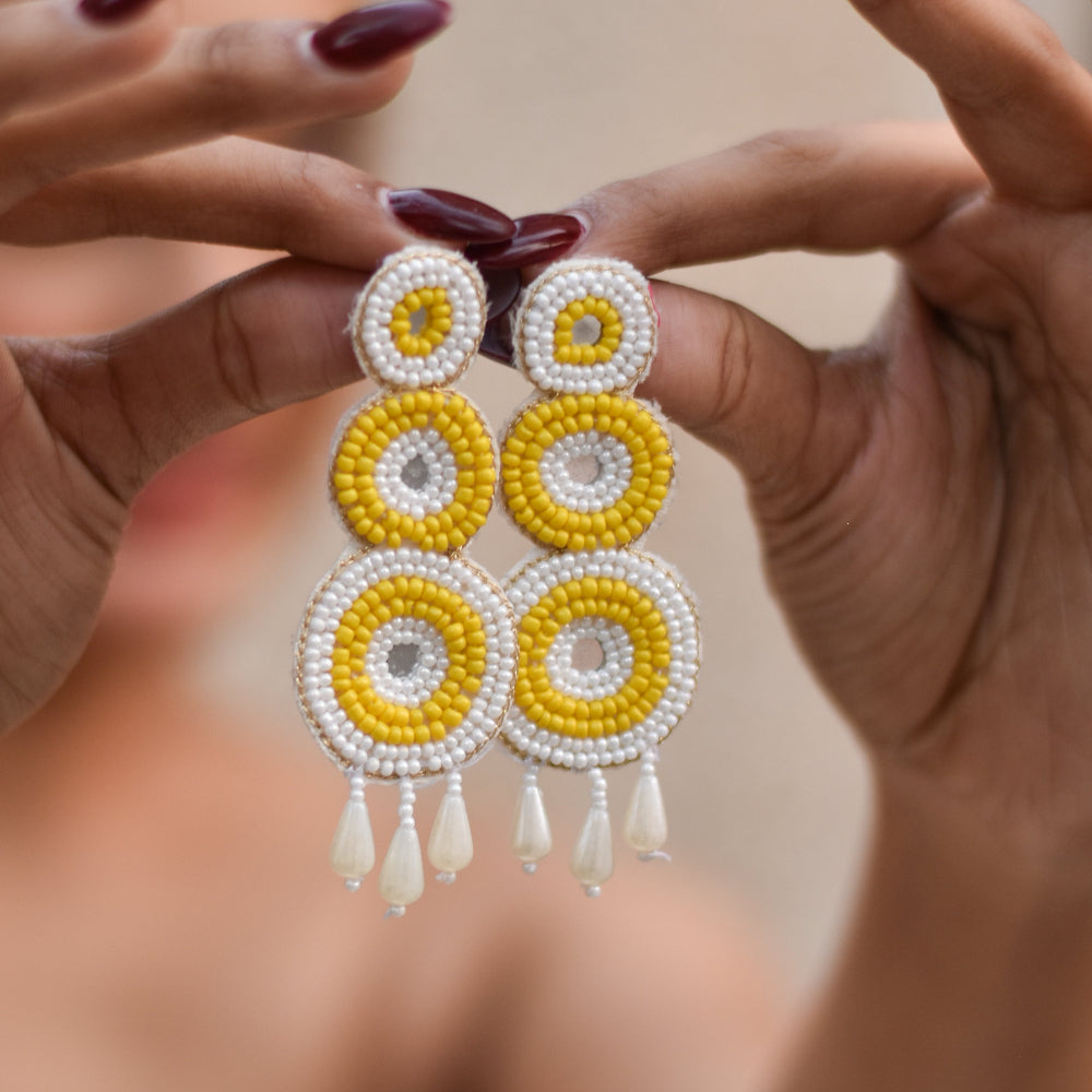 Yellow and white earrings for haldi functions