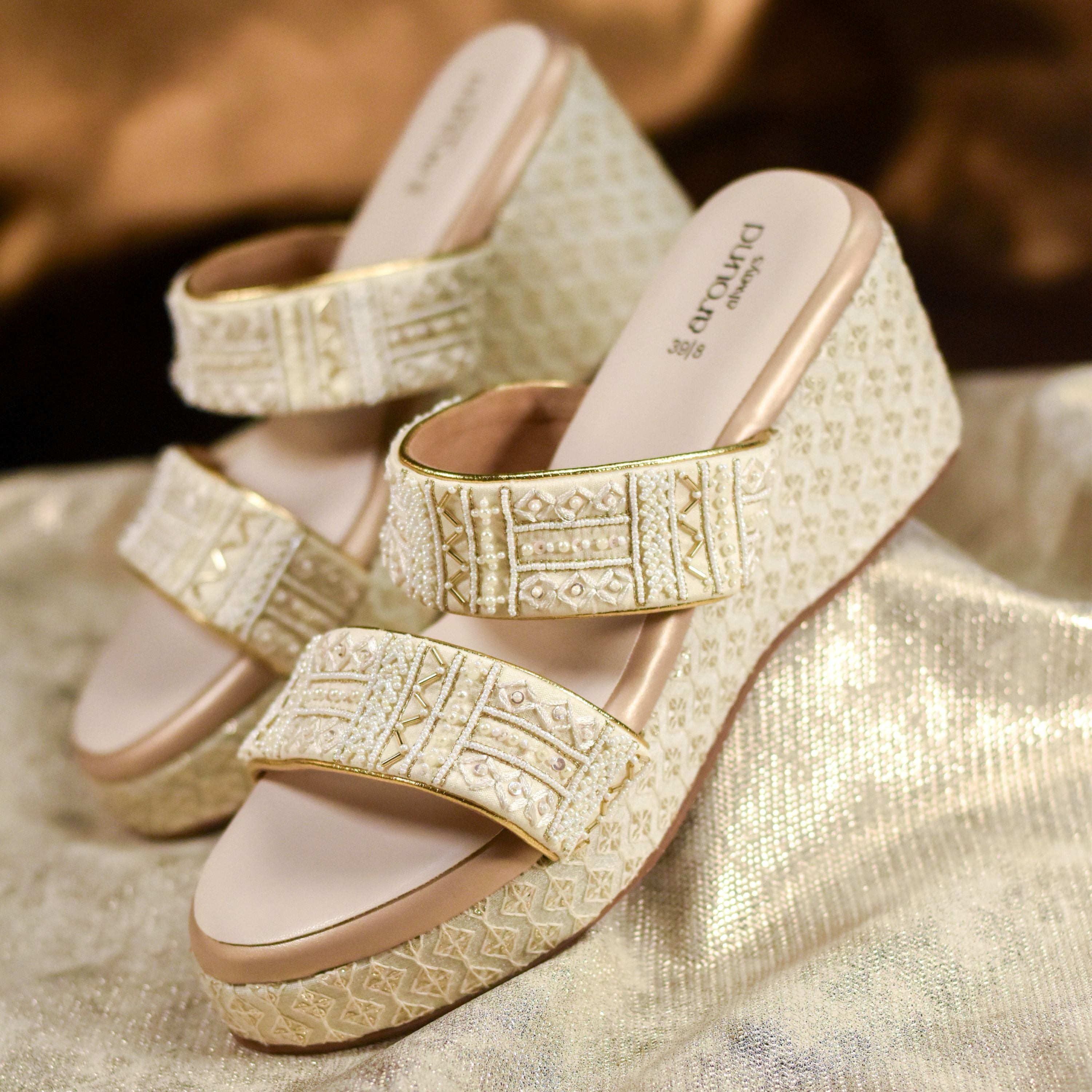 Festive party wear wedge heels in gold with sequins.