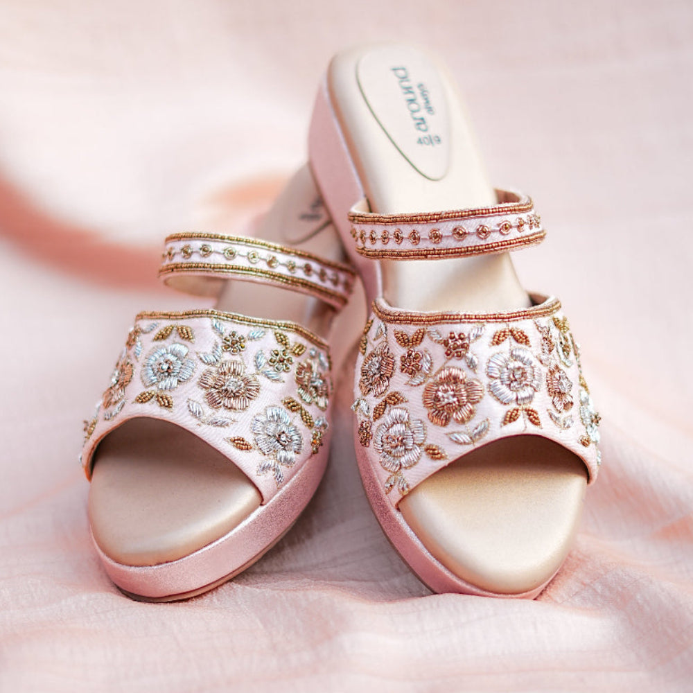 Stylish embroidered wedge sandal with soft platform and detailed floral motif for occasion wear