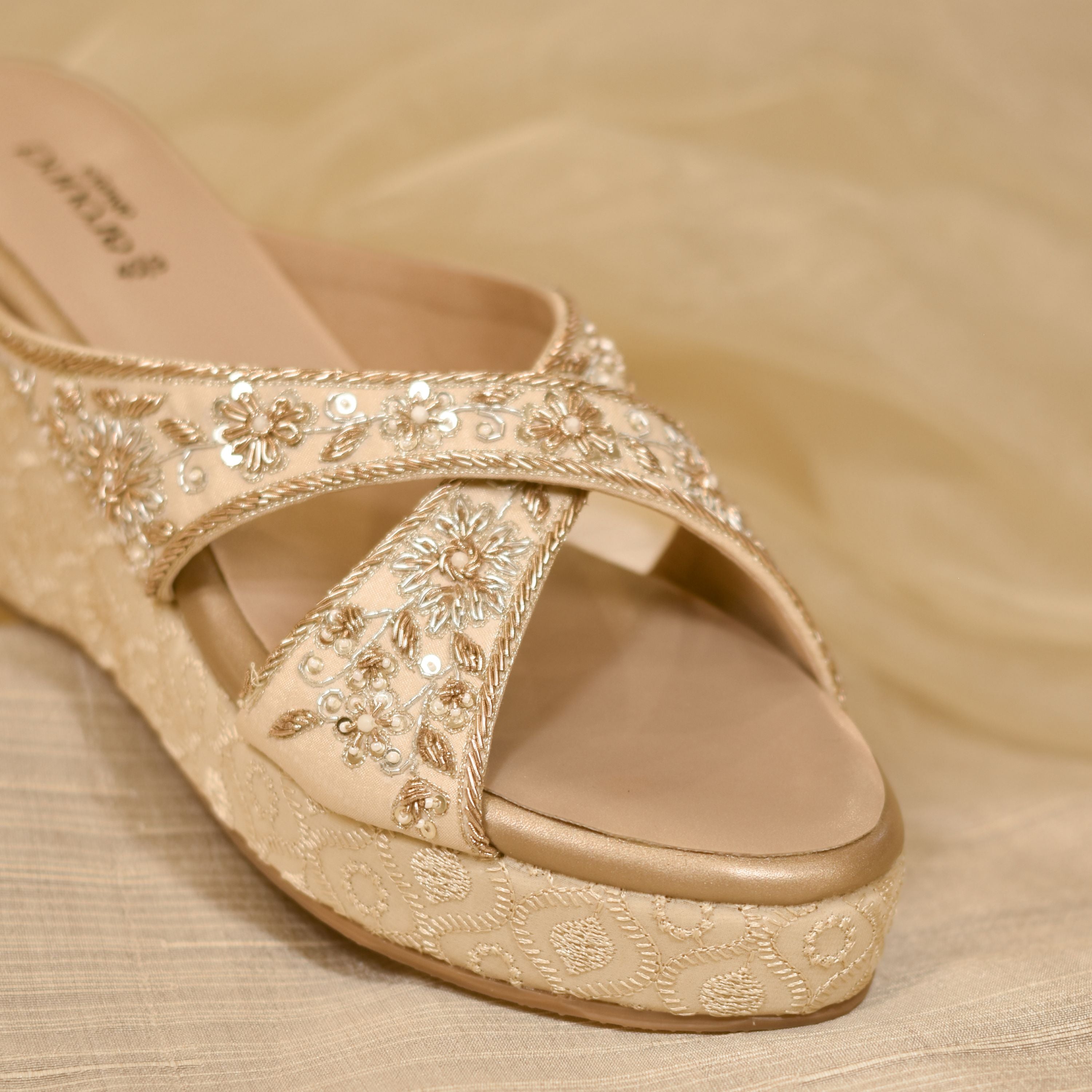 Comfortable ethnic footwear with golden detailing and padded wedge sole