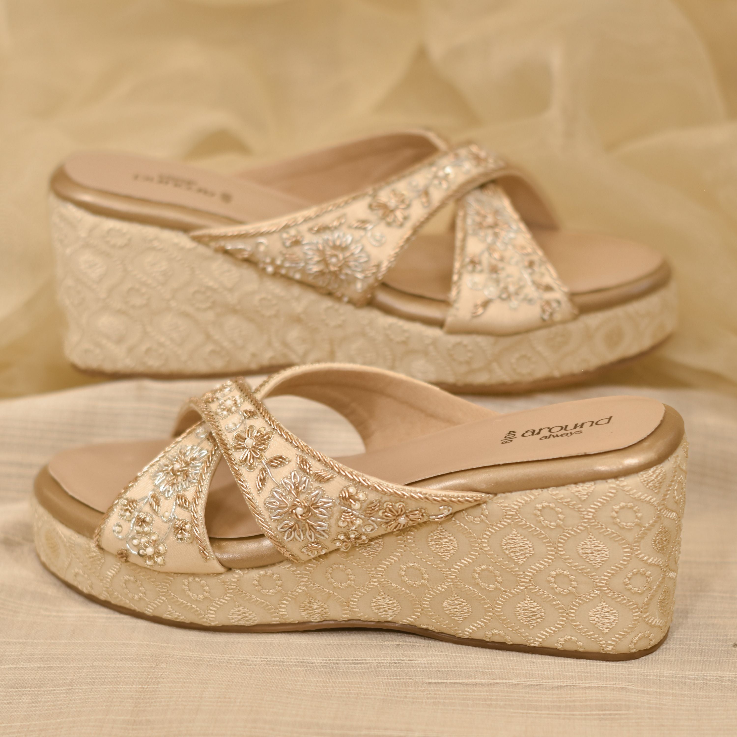 Beige festive slip-ons featuring handcrafted zari and thread details