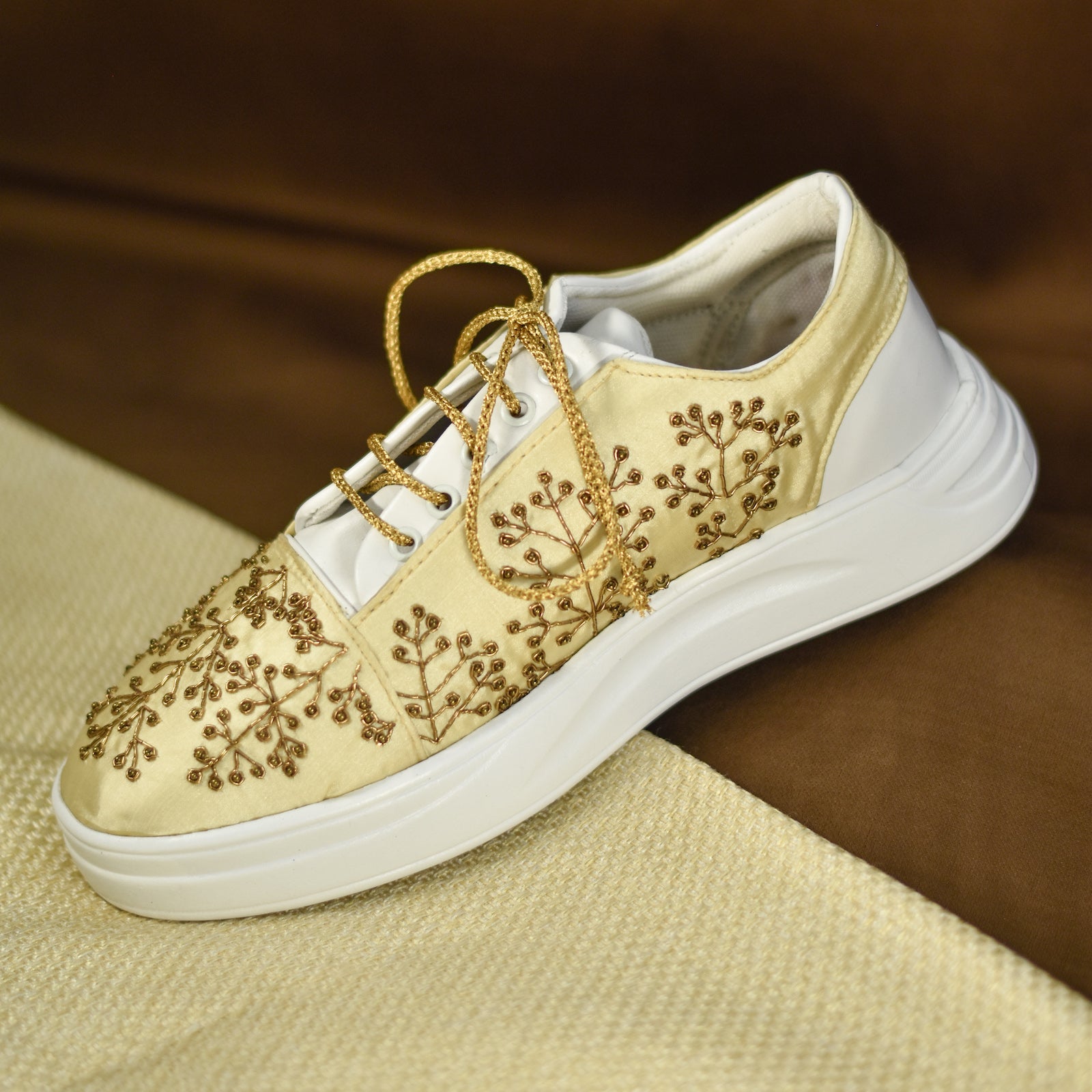 Stylish bridal sneaker design in versatile golden colour