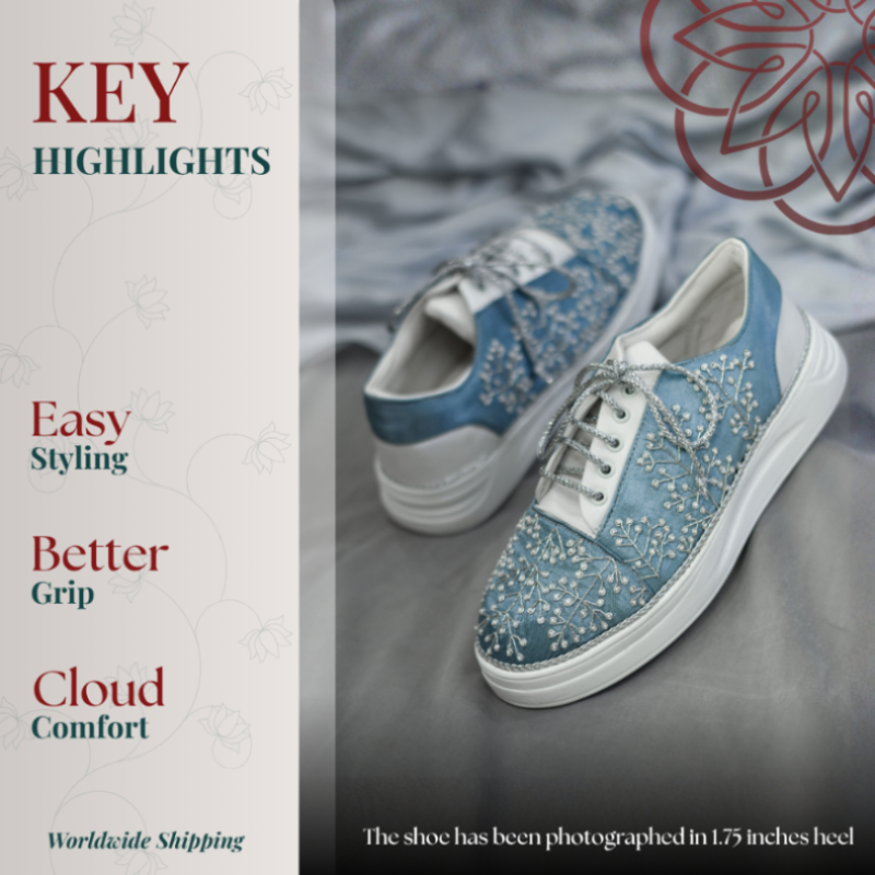 Blue embroidered sneaker with lace up detail, cushioned sole, and lightweight design for easy styling and all day comfort