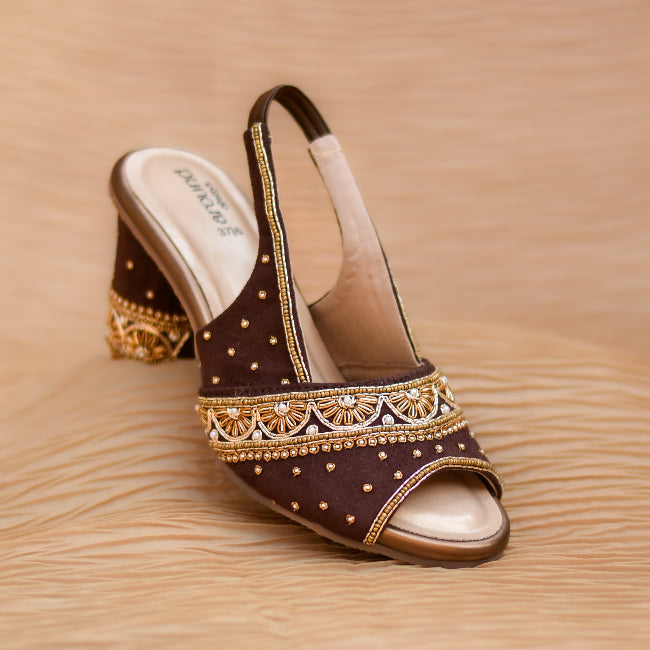 Traditional party heels in deep brown with beaded border design.