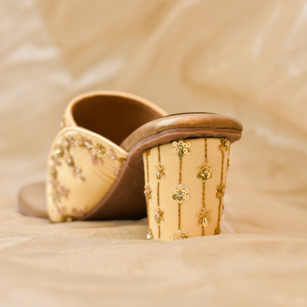 Designer gold block heels for weddings and festive celebrations.