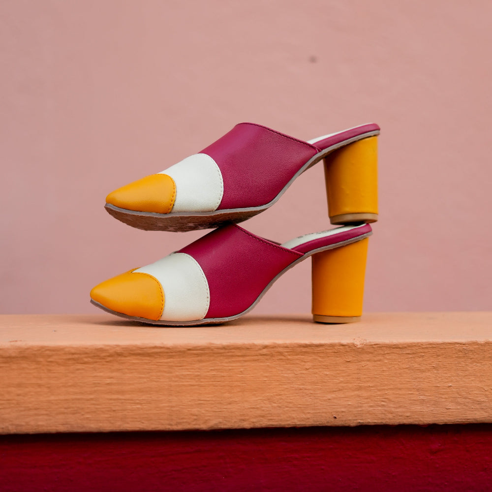 Statement mule in bold colour-block pattern with pointed front and structured heel