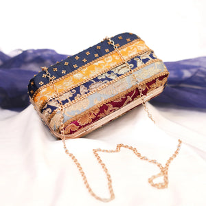 Multicolour festive clutch with detachable gold chain strap
