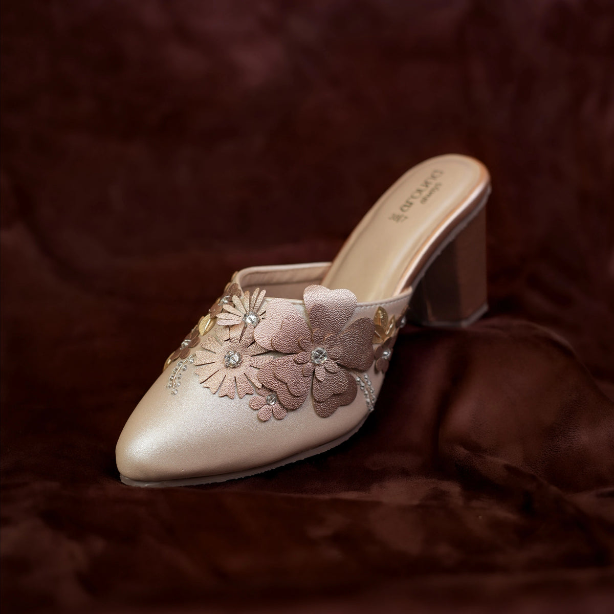 Champagne block heel mules for women with blush and gold 3D flowers and crystals, side view