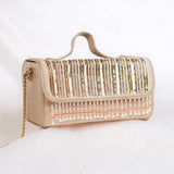 Aza beige vanity box clutch with gold sequin strips and pearl fringe for sangeet