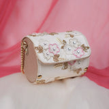 Dream Cream circle clutch with raised pink and ivory flowers for engagements