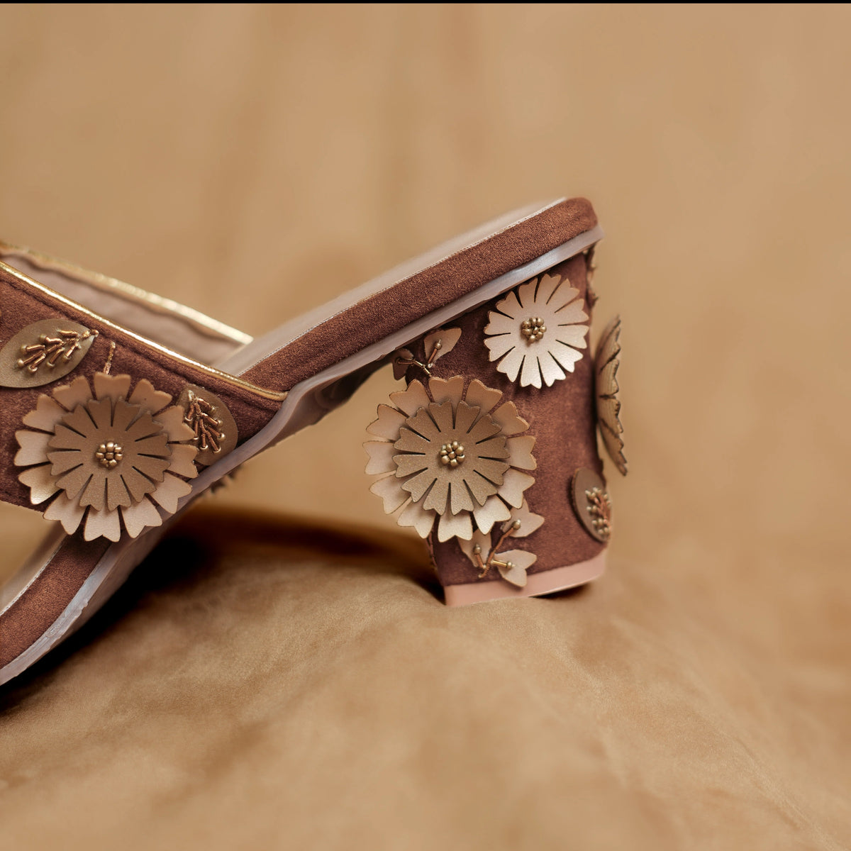 Traditional style women’s sandal with 3D floral embellishments
