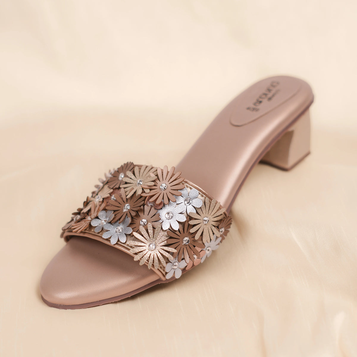 Eden blush beige open toe slide sandal with 3D flower embellished strap, side view