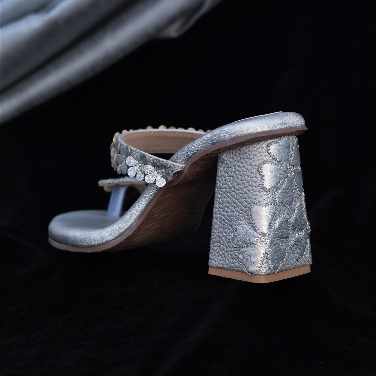 Silver floral sandals with embellished strap and wedge heel