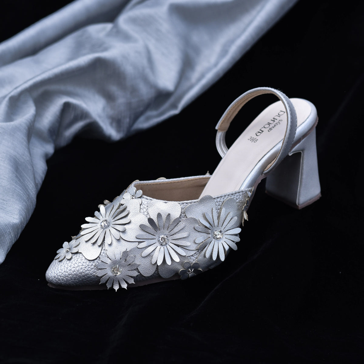 Metallic heels with dimensional floral appliqués and block heel