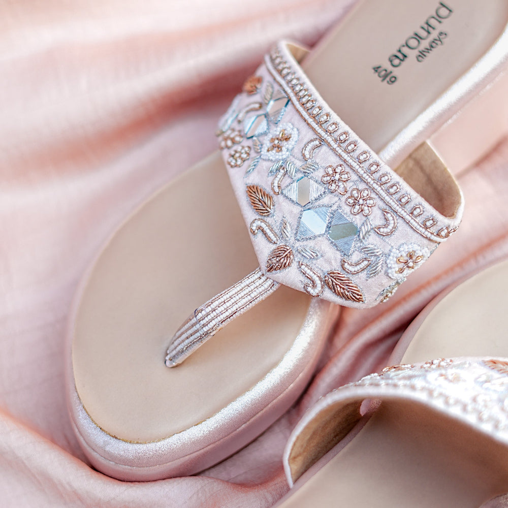 Festive footwear showcasing subtle mirror and beads detailing