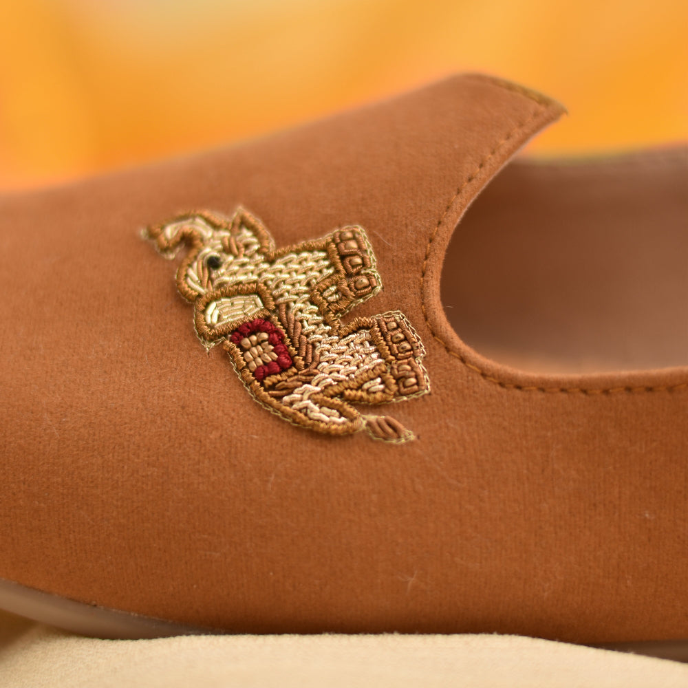 Contemporary mojri design with traditional elephant motif and streamlined shape