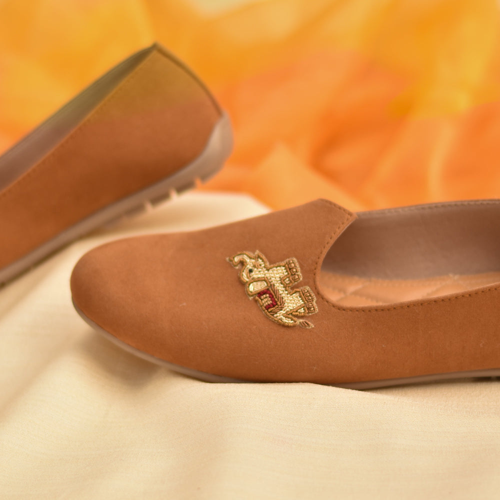 Classic brown handcrafted loafers with fine stitched motif and all-day comfort