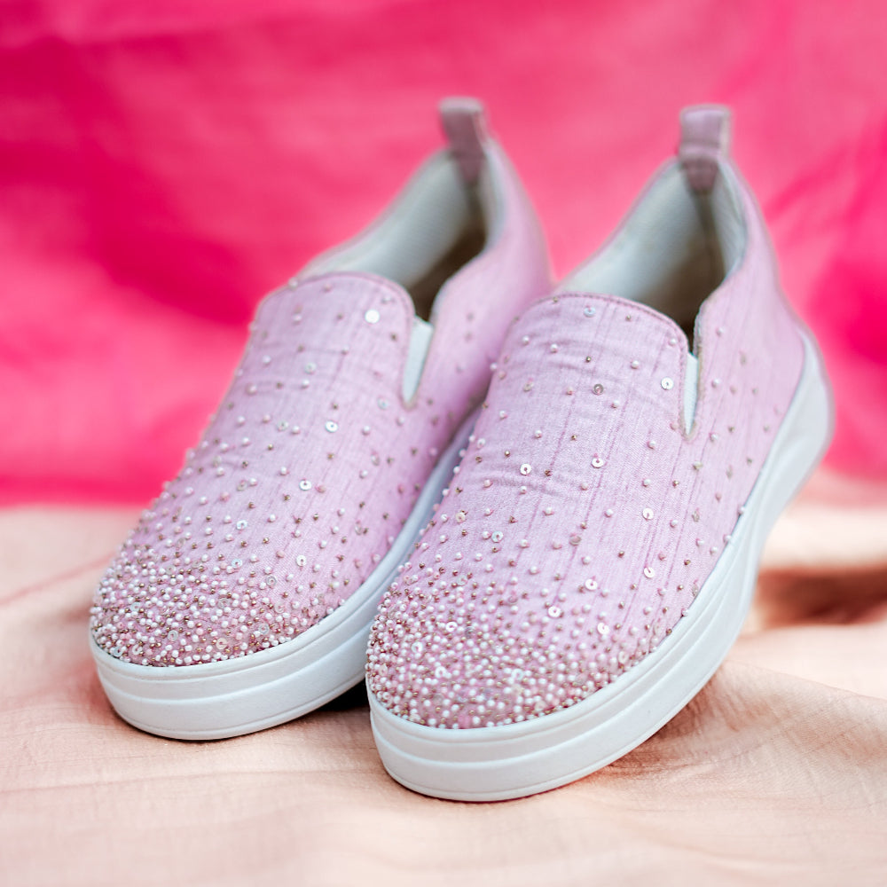 Blush pink slip-on sneaker with subtle embellishment